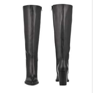 Brand new, never won. The Brixe Heeled Boots.